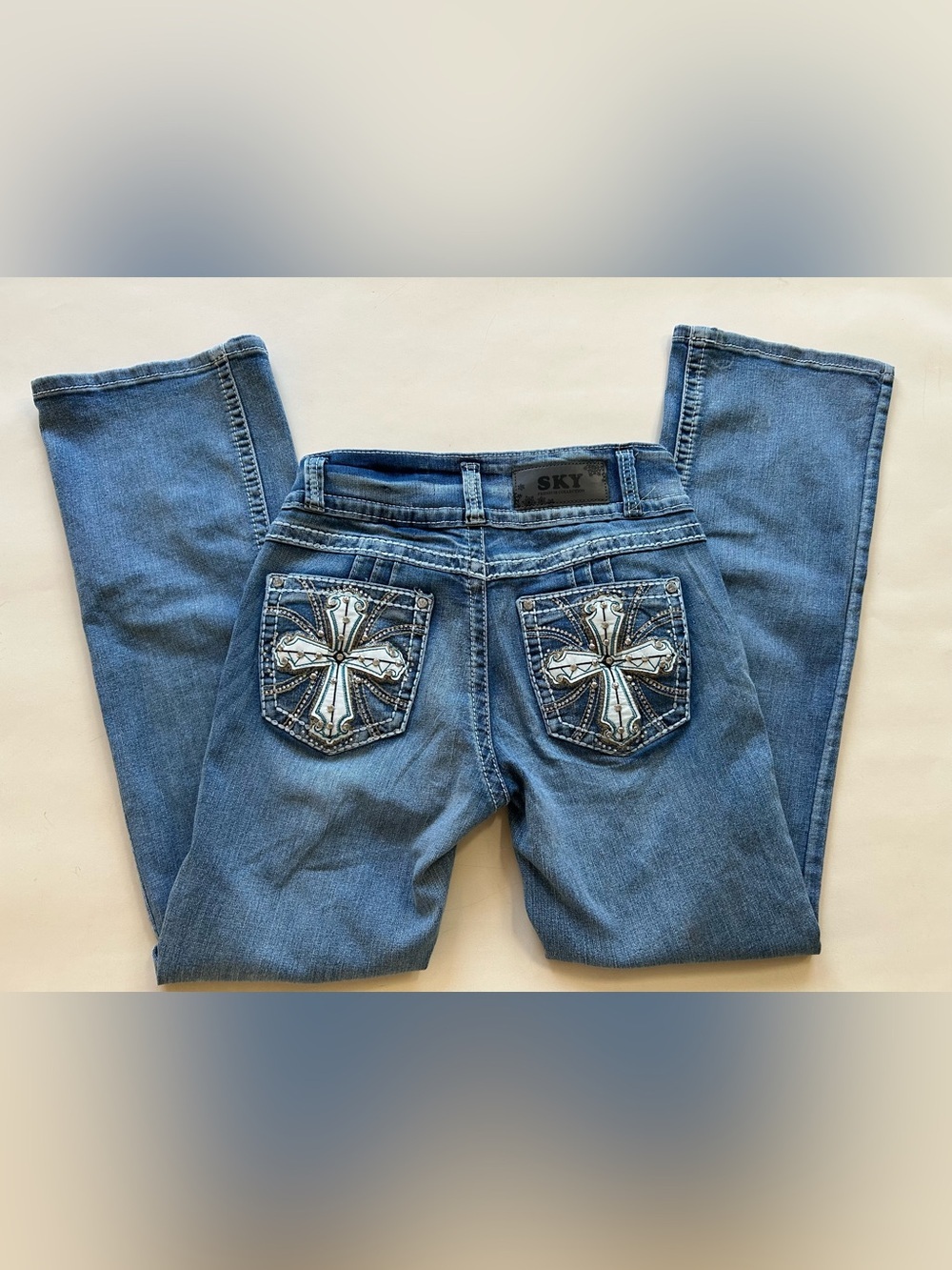 Sky Women's Light Blue Jeans with Embellished Cross Pockets size 7/8